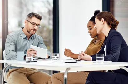 Candidate speaking with a recruiter in a professional meeting